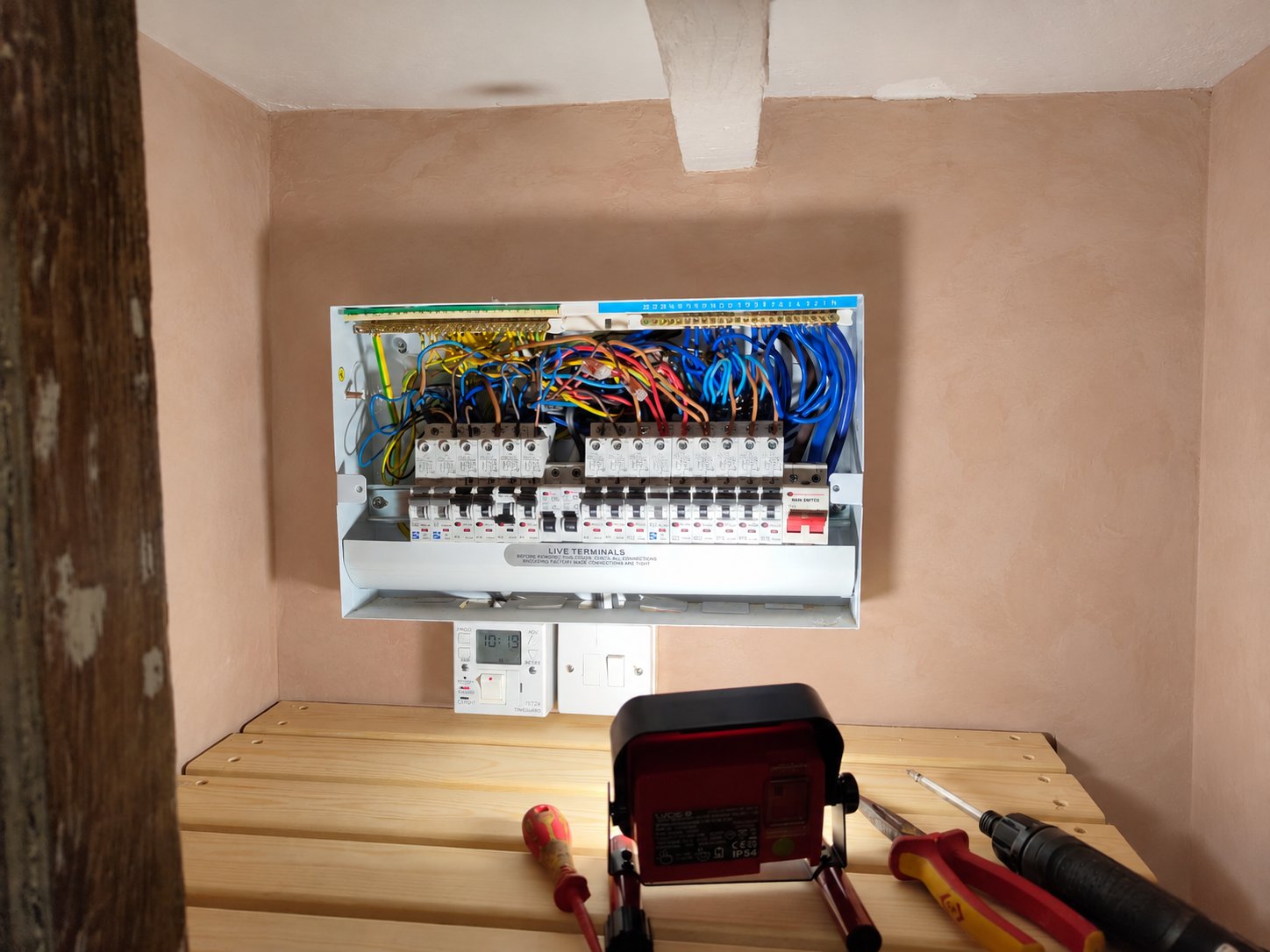 Commercial distribution board being installed with cable tray and busbar