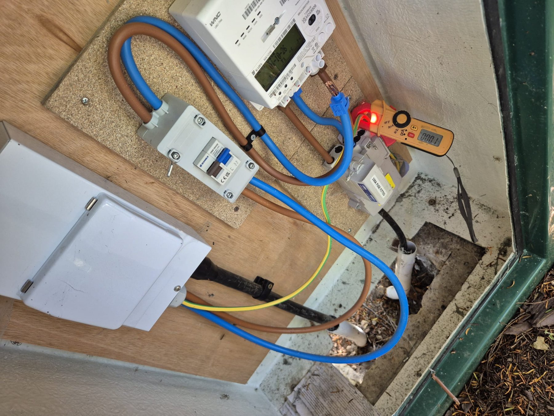 Flush mounted consumer unit with RCBOs and surge protection being installed